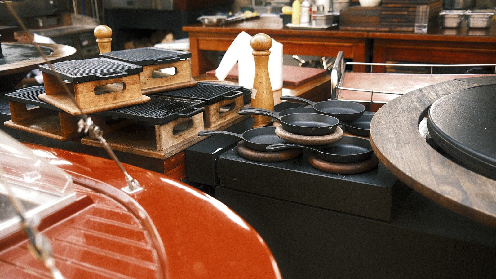 Kitchen setup showcasing grilling equipment and cooking tools at a busy restaurant undefined